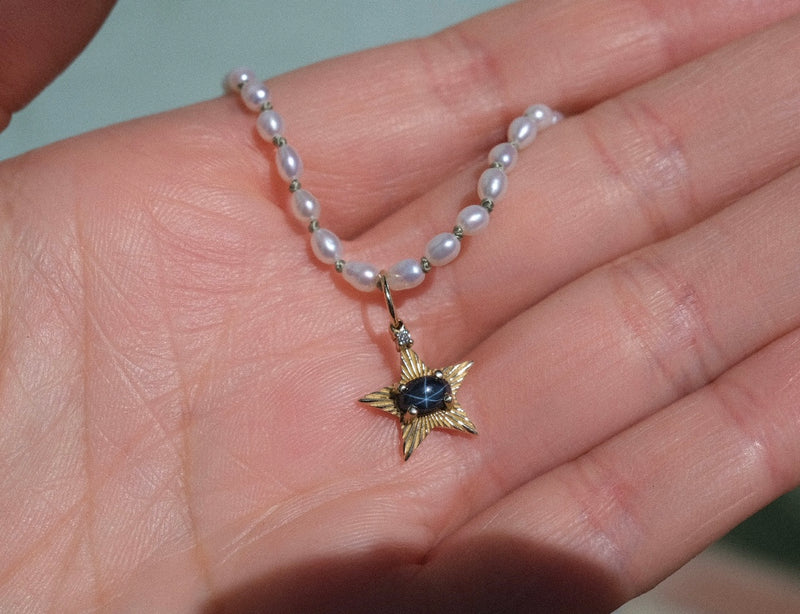 StarLight charm with dark blue star sapphire and diamond