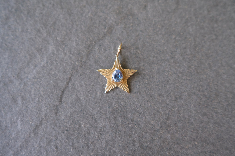 Starlight charm with blue sapphire